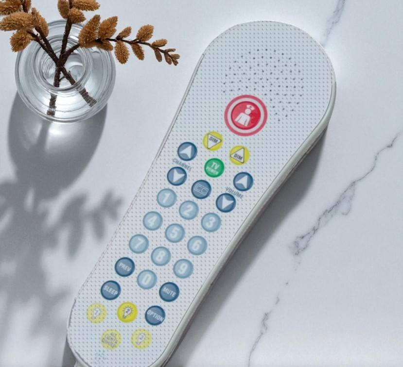 Medical bed remote control with protective phone mask covering